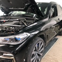 Оклейка BMW X5 защитной плёнкой Hexis Bodyfence в Калининграде